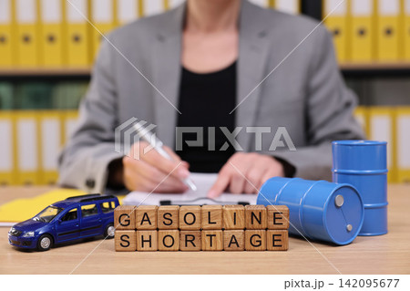 Gasoline shortage discussion with toys and wooden blocks reflects on current fuel issues Gasoline shortage discussion with toys and wooden blocks reflects on current fuel issues 142095677