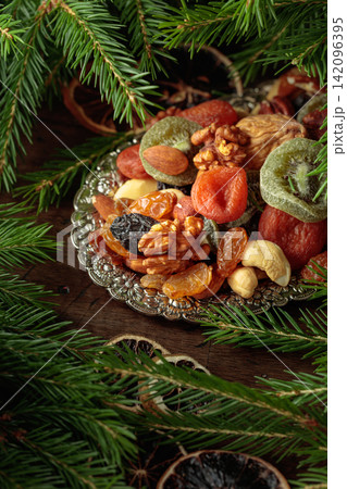 Assorted dried fruits and nuts on a silver tray. Assorted dried fruits and nuts on a silver tray. 142096395