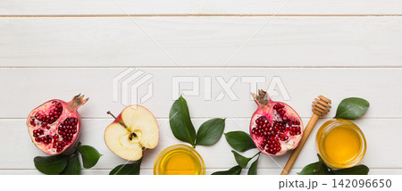 Flat lay composition with symbols jewish Rosh Hashanah holiday attributes on colored background, Rosh hashanah concept. New Year holiday Traditional. Top view with copy space Flat lay composition with symbols jewish Rosh Hashanah holiday attributes on colored background, Rosh hashanah concept. New Year holiday Traditional. Top view with copy space 142096650