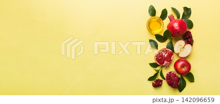 Flat lay composition with symbols jewish Rosh Hashanah holiday attributes on colored background, Rosh hashanah concept. New Year holiday Traditional. Top view with copy space Flat lay composition with symbols jewish Rosh Hashanah holiday attributes on colored background, Rosh hashanah concept. New Year holiday Traditional. Top view with copy space 142096659