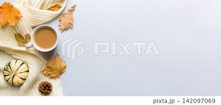 Cup of cocoa with autumn leaves abstract still life top view vith copy space 142097069