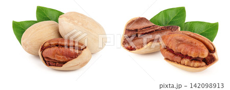 Three pecan nuts isolated on white background Three pecan nuts isolated on white background 142098913