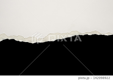 White ripped paper torn edges strips isolated on black background White ripped paper torn edges strips isolated on black background 142098922