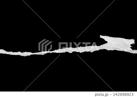 Ripped torn paper edges isolated on black background 142098923