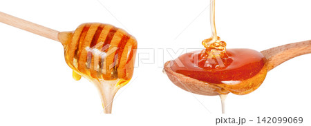 Honey stick with flowing honey isolated on white background 142099069