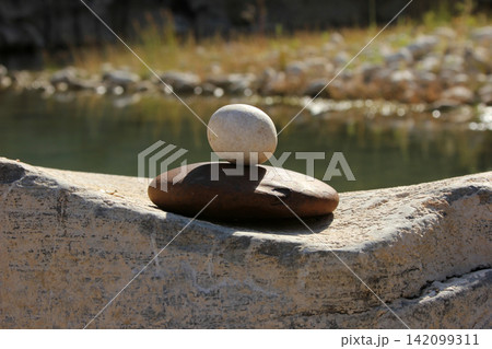 Stones by the river. Nature background. Stones by the river. Nature background. 142099311