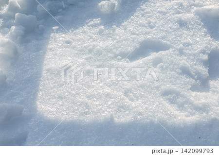 Close up of white snow surface with texture Close up of white snow surface with texture 142099793
