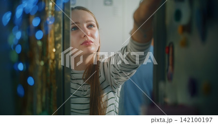 Teenage Schoolgirl Personalizes Locker by Decorating with Colorful Emoji Stickers Teenage Schoolgirl Personalizes Locker by Decorating with Colorful Emoji Stickers 142100197