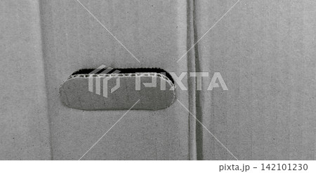 Grey corrugated cardboard box with hand holes. Grey corrugated cardboard box with hand holes. 142101230