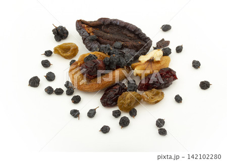 Various dried fruits on a white background. Various dried fruits on a white background. 142102280