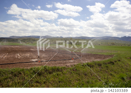 Irrigation system, water saving irrigation system agricultural background 142103389