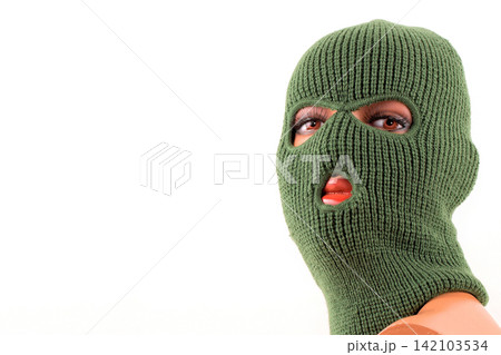 Green balaclava on a white background Green balaclava on a white background 142103534