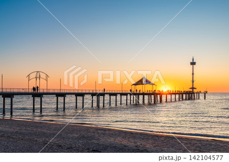 Brighton Beach Jetty at sunset with people silhouettes, Adelaide, South Australia Brighton Beach Jetty at sunset with people silhouettes, Adelaide, South Australia 142104577