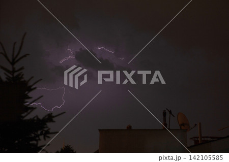 Thunderstorm lightning with dark cloudy sky Thunderstorm lightning with dark cloudy sky 142105585