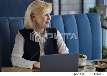 Senior Woman Pondering. Older Woman In Business Thoughtfully Assessing Her Decisionmaking Process. An Experienced Female Executive Carefully Reflecting On Potential Paths Before Making Choice 142106085