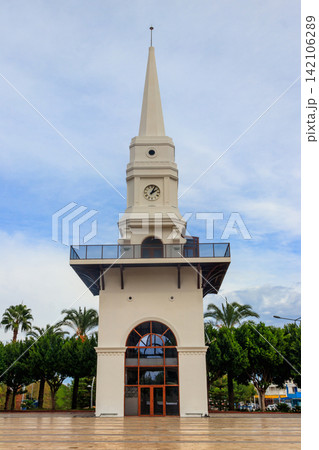 White clock tower in the center of Kemer, Antalya province, Turkey 142106289