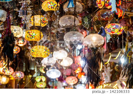 Turkish mosaic lamps or Moroccan lanterns at store. Shop of oriental souvenirs Turkish mosaic lamps or Moroccan lanterns at store. Shop of oriental souvenirs 142106333