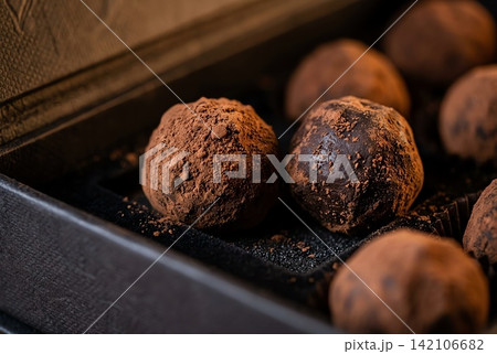 a box of chocolates and cookies in a box a box of chocolates and cookies in a box 142106682