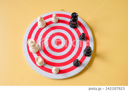 Chess pieces on dart board bullseye center , fighting of business concept. 142107923