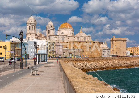 Cadiz Cathedral and Seafront Promenade on the Atlantic Coast, Spain Cadiz Cathedral and Seafront Promenade on the Atlantic Coast, Spain 142111373