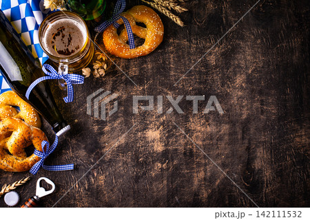 Bavarian brezel and beer, Oktoberfest food Bavarian brezel and beer, Oktoberfest food 142111532