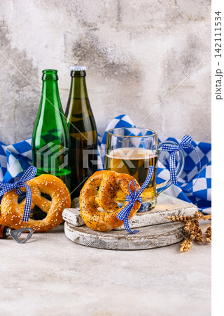 Bavarian brezel and beer, Oktoberfest food 142111534