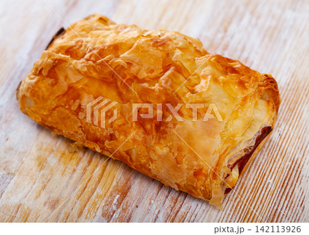 Appetizing stuffed napolitana with ham and cheese Appetizing stuffed napolitana with ham and cheese 142113926