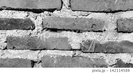 Black and white rough brick wall texture background Black and white rough brick wall texture background 142114589
