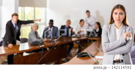 Frustrated young white light-haired female worker getting fired 142114591
