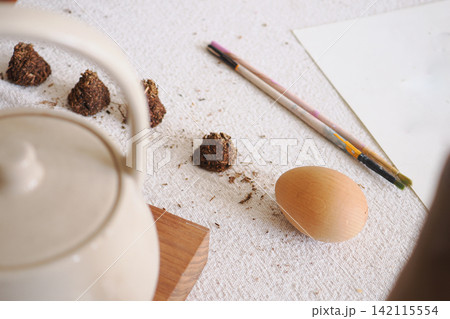 Tea and craft materials on a table Tea and craft materials on a table 142115554