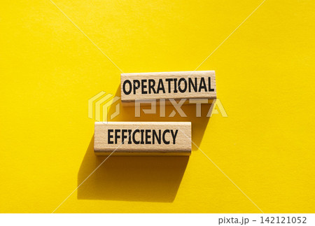 Operational efficiency symbol. Concept word Operational efficiency on wooden blocks. Beautiful yellow background. Business and Operational efficiency concept. Copy space Operational efficiency symbol. Concept word Operational efficiency on wooden blocks. Beautiful yellow background. Business and Operational efficiency concept. Copy space 142121052
