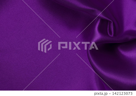 Purple fabric cloth texture for background and design art work, beautiful crumpled pattern of silk or linen. Purple fabric cloth texture for background and design art work, beautiful crumpled pattern of silk or linen. 142123073