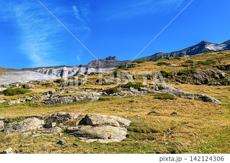 Hiking trail in Cirque de Troumouse at Heas in the Hautes-Pyrenees department in France, forming the border with Spain 142124306