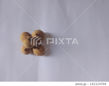 Fresh Langsat Fruit Lansium domesticum on Wooden Table copy space Fresh Langsat Fruit Lansium domesticum on Wooden Table copy space 142124704