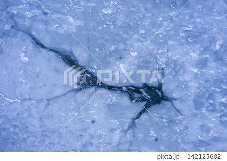 ice hole, frozen lake, aerial view ice hole, frozen lake, aerial view 142125682