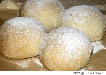 Close up of freshy made home baked bread rolls Close up of freshy made home baked bread rolls 142126623