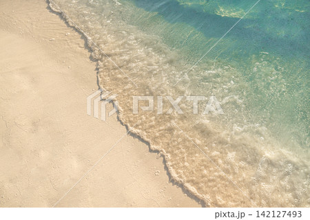 Serene overhead soft foam wave sliding powdery shore glassy azure tropical shallows minimal gradient. Seascape design backdrop scenic. Coastal drone abstract wallpaper wall art Serene overhead soft foam wave sliding powdery shore glassy azure tropical shallows minimal gradient. Seascape design backdrop scenic. Coastal drone abstract wallpaper wall art 142127493