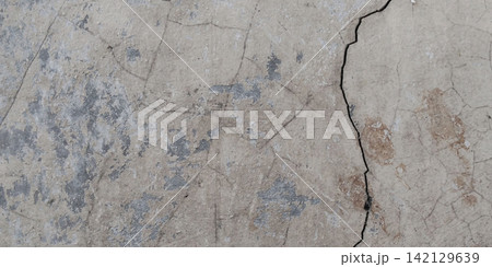 Cracked and peeling concrete wall texture Cracked and peeling concrete wall texture 142129639