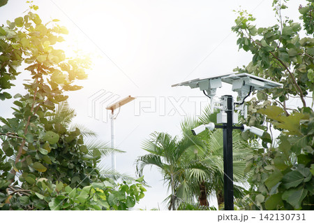 IP CCTV camera install by have water proof cover to protect camera with home security system concept. IP CCTV camera install by have water proof cover to protect camera with home security system concept. 142130731