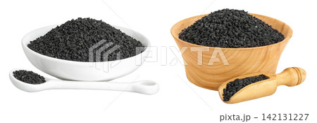 Nigella sativa or Black cumin in ceramic and wooden bowl isolated on white background 142131227