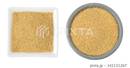 Amaranth grain seeds in ceramic bowl isolated on white background. Top view. Flat lay 142131267