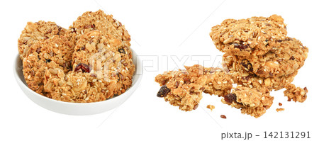 Granola cookie in ceramic bowl isolated on white background with full depth of field Granola cookie in ceramic bowl isolated on white background with full depth of field 142131291