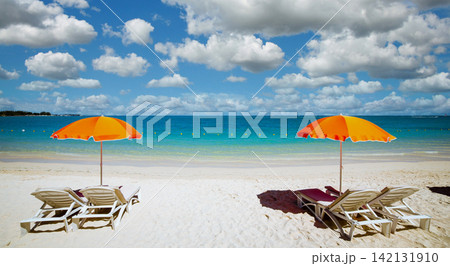 Parasols and beach in Mauritius island Parasols and beach in Mauritius island 142131910