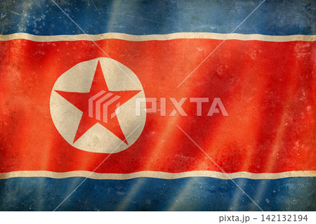Old vintage flag of North Korea, worn and stained 142132194