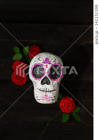 Day of the Dead Sugar Skull Still Life with Marigolds, Roses, and Candles Day of the Dead Sugar Skull Still Life with Marigolds, Roses, and Candles 142132399