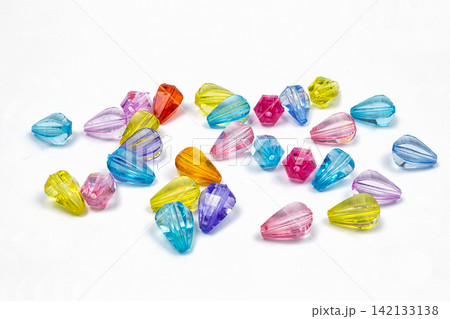 Colored beads for design on a white background Colored beads for design on a white background 142133138