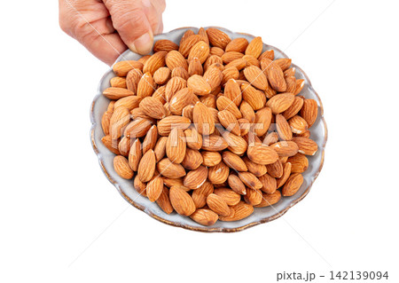 raw Almond Kernels Nut Food Ingredient Closeup raw Almond Kernels Nut Food Ingredient Closeup 142139094