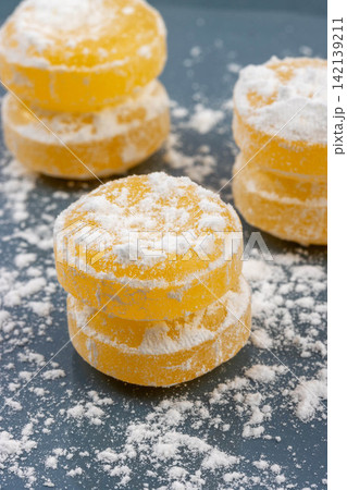 sour Lemon Hard Candies Coated with Powdered Sugar 142139211