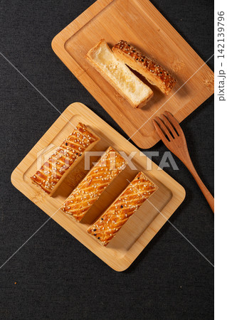 savory Layered Puff Pastry Snack with Crispy Texture savory Layered Puff Pastry Snack with Crispy Texture 142139796