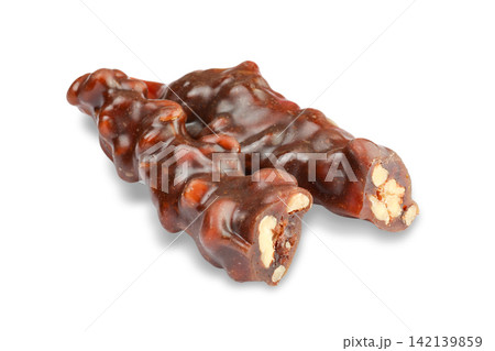 Treats of Churchkhela reveal a blend of nuts and grape juice, PNG 142139859